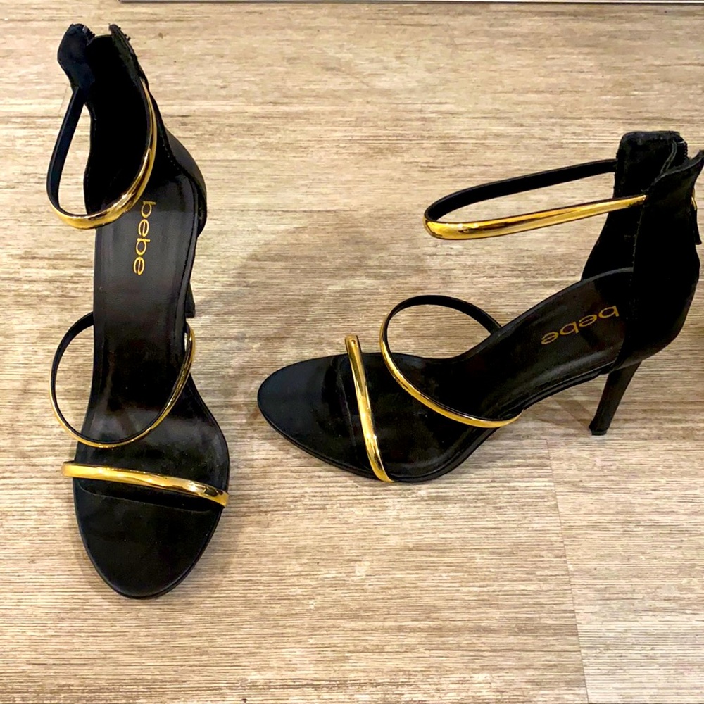 Black and gold bebe heels